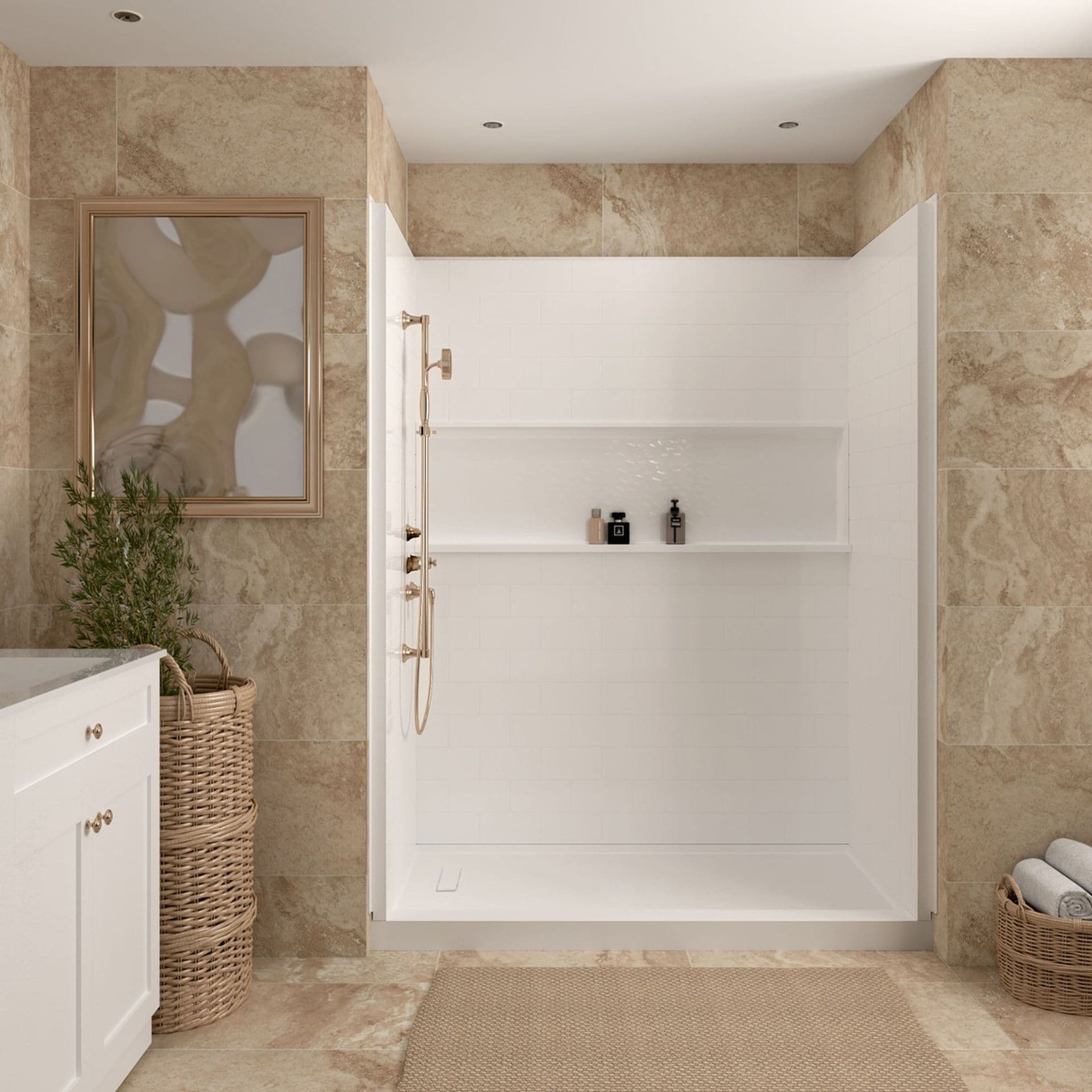 Modern bathroom with walk-in shower featuring white subway tile surround and built-in shelves, beige marble tile walls, white vanity with brass hardware, and woven storage baskets